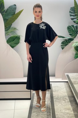Black Dress with Flower Brooch and Slit