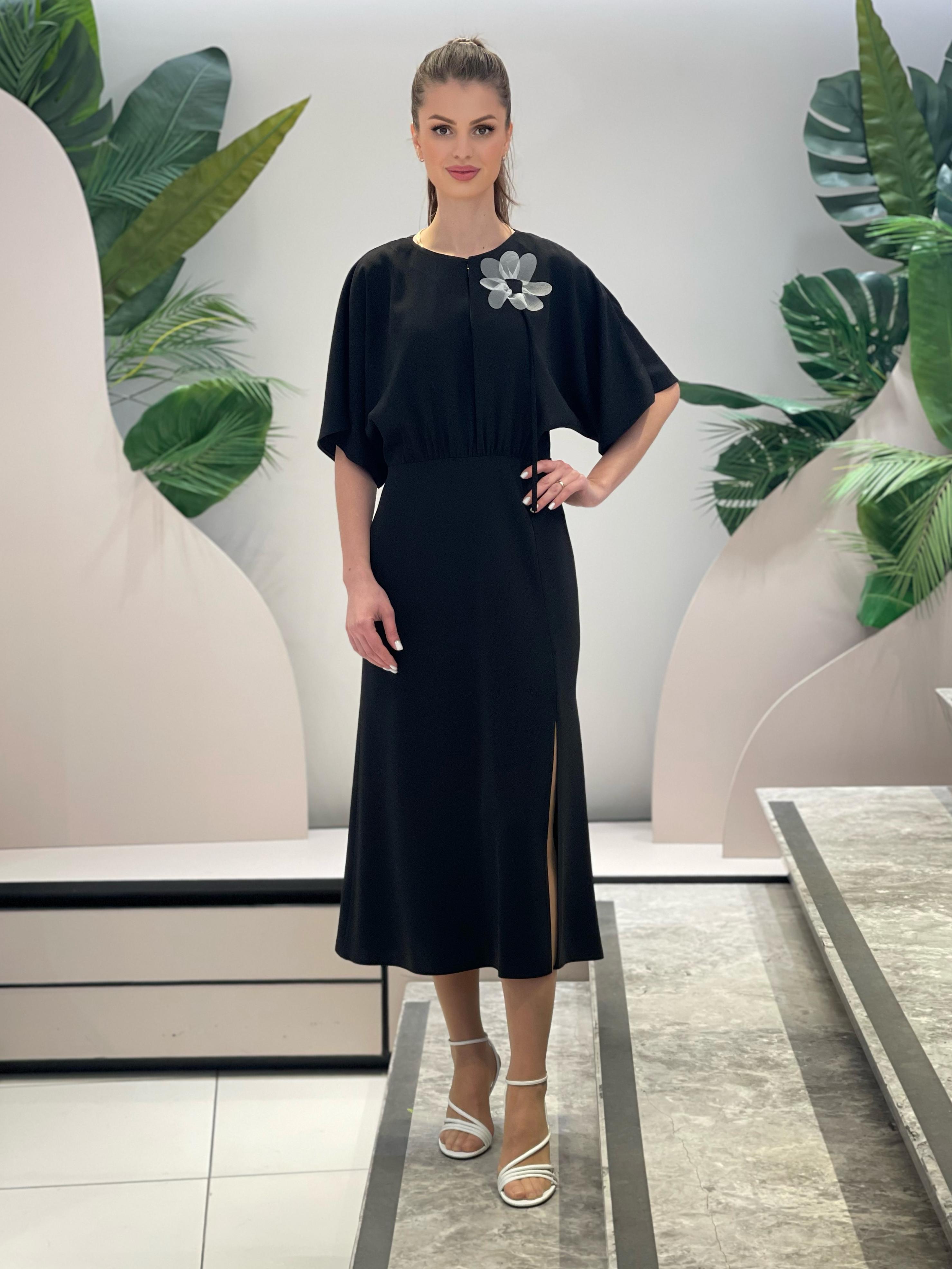 Black Dress with Flower Brooch and Slit